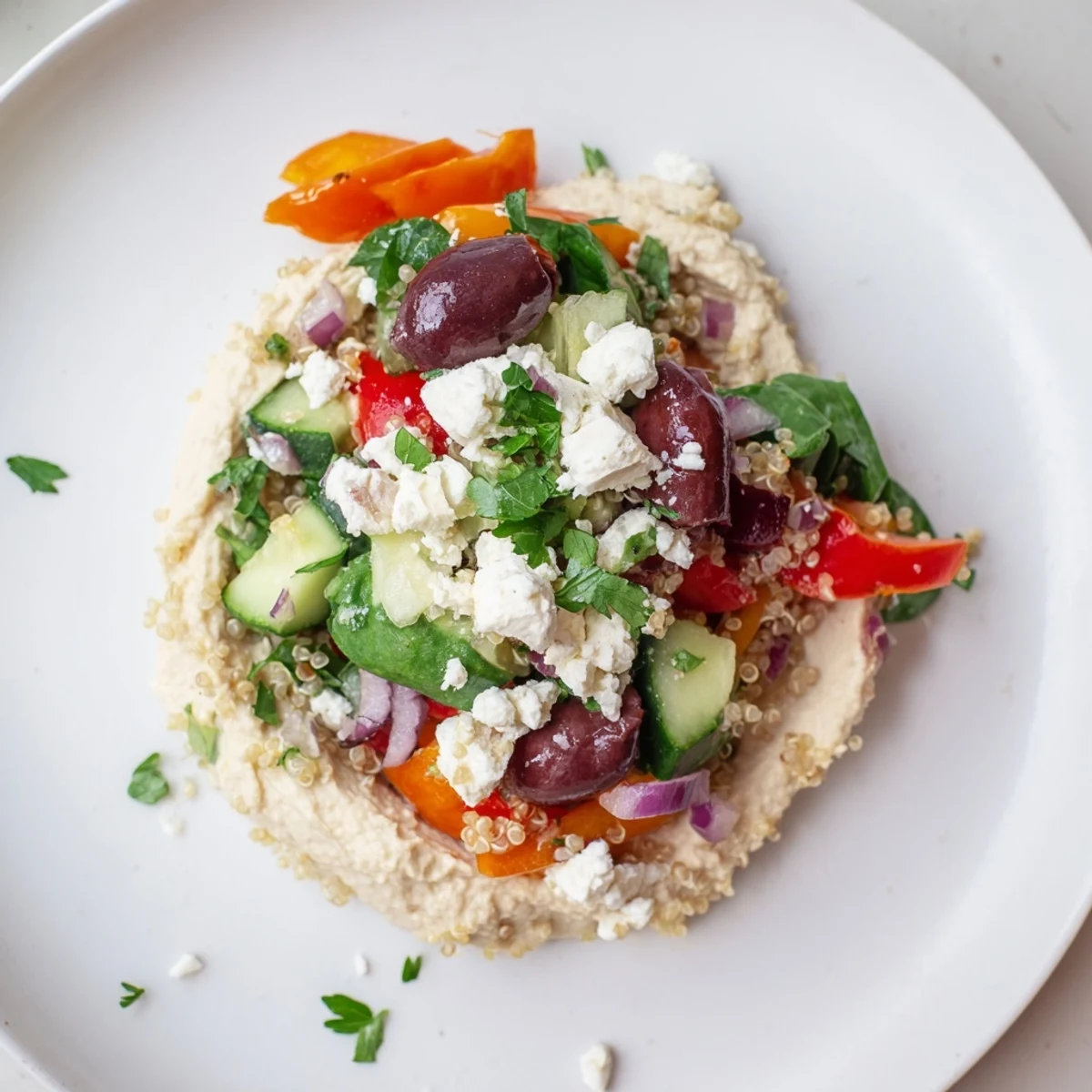 A close-up of a delightful Mediterranean Quinoa Bowl, full of textures and bright flavors.